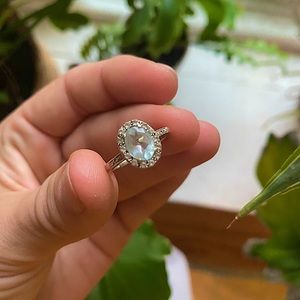 14 K White gold ring with aquamarine & diamonds